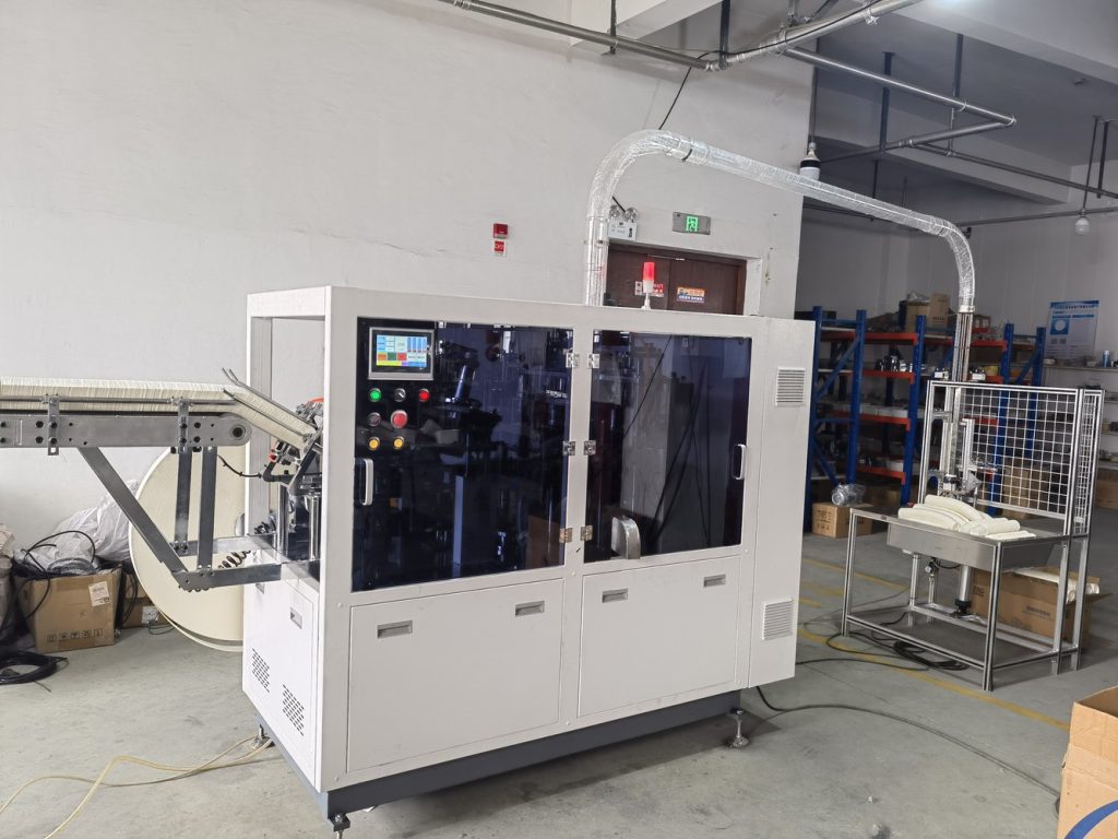 High-speed paper cup machines arranged in a production workshop