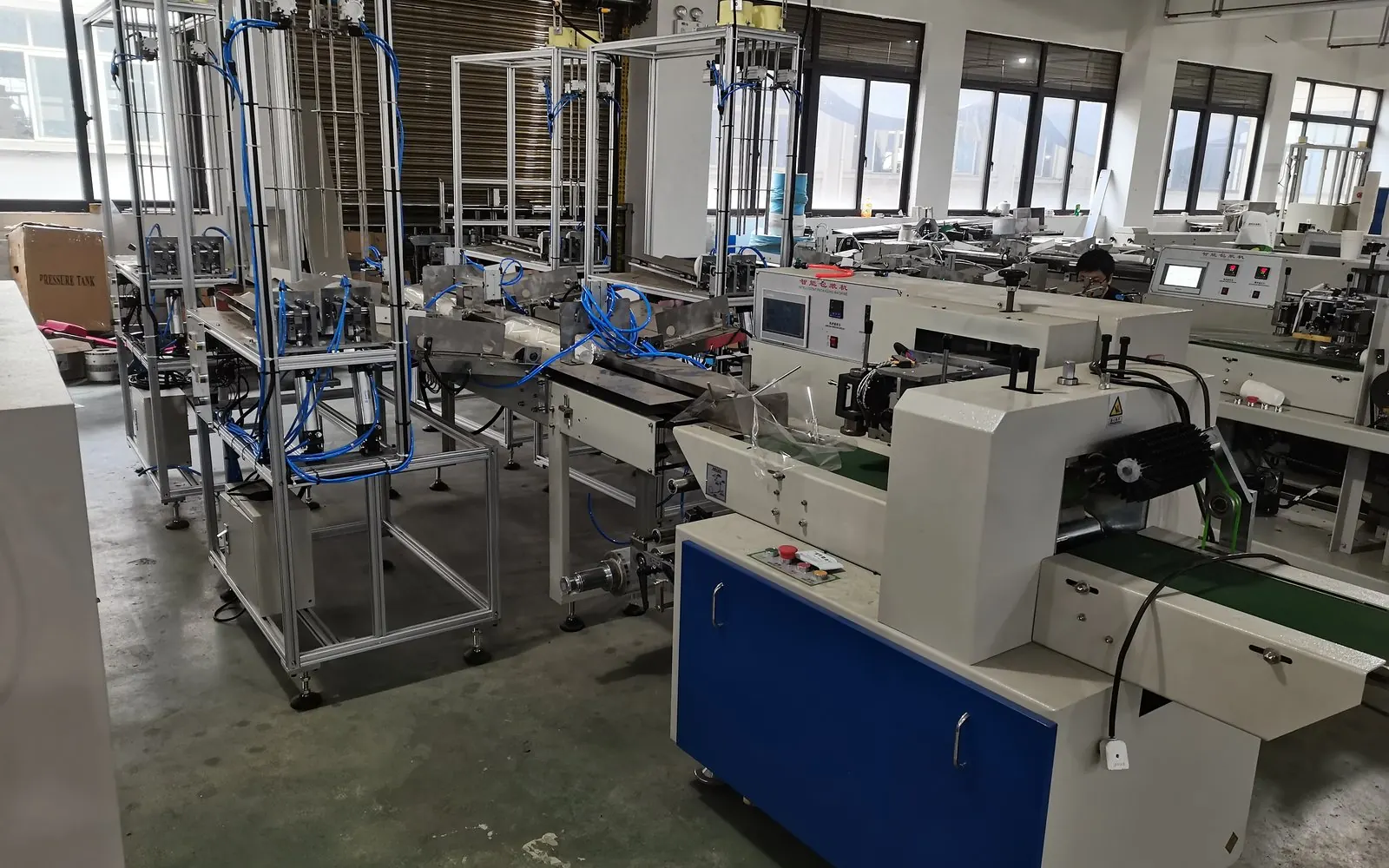 Supporting production and packing equipment in a machinery workshop
